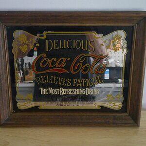 vintage coca cola advertising mirror, framed in wood